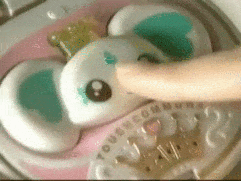 A person booping a magical girl's companion's snout.