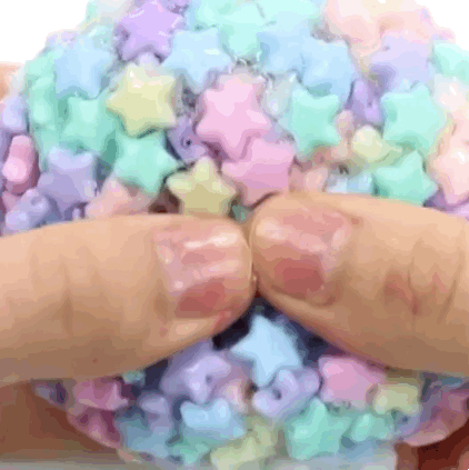 A person playing with a ton of stars.
